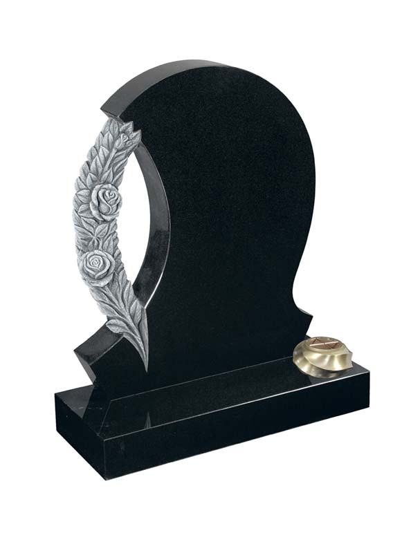 Headstone with carved flowers